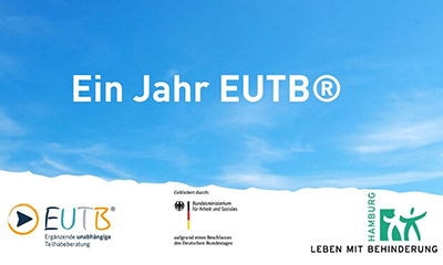 Text "Ein Jahr EUTB" vor blauem Himmel
